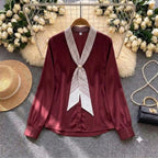 Celine Tie-Neck Chiffon Blouse in burgundy with striped bow collar
