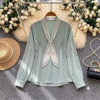 Celine Tie-Neck Chiffon Blouse in sage green with striped bow collar