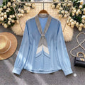 Celine Tie-Neck Chiffon Blouse in sky blue with striped bow collar