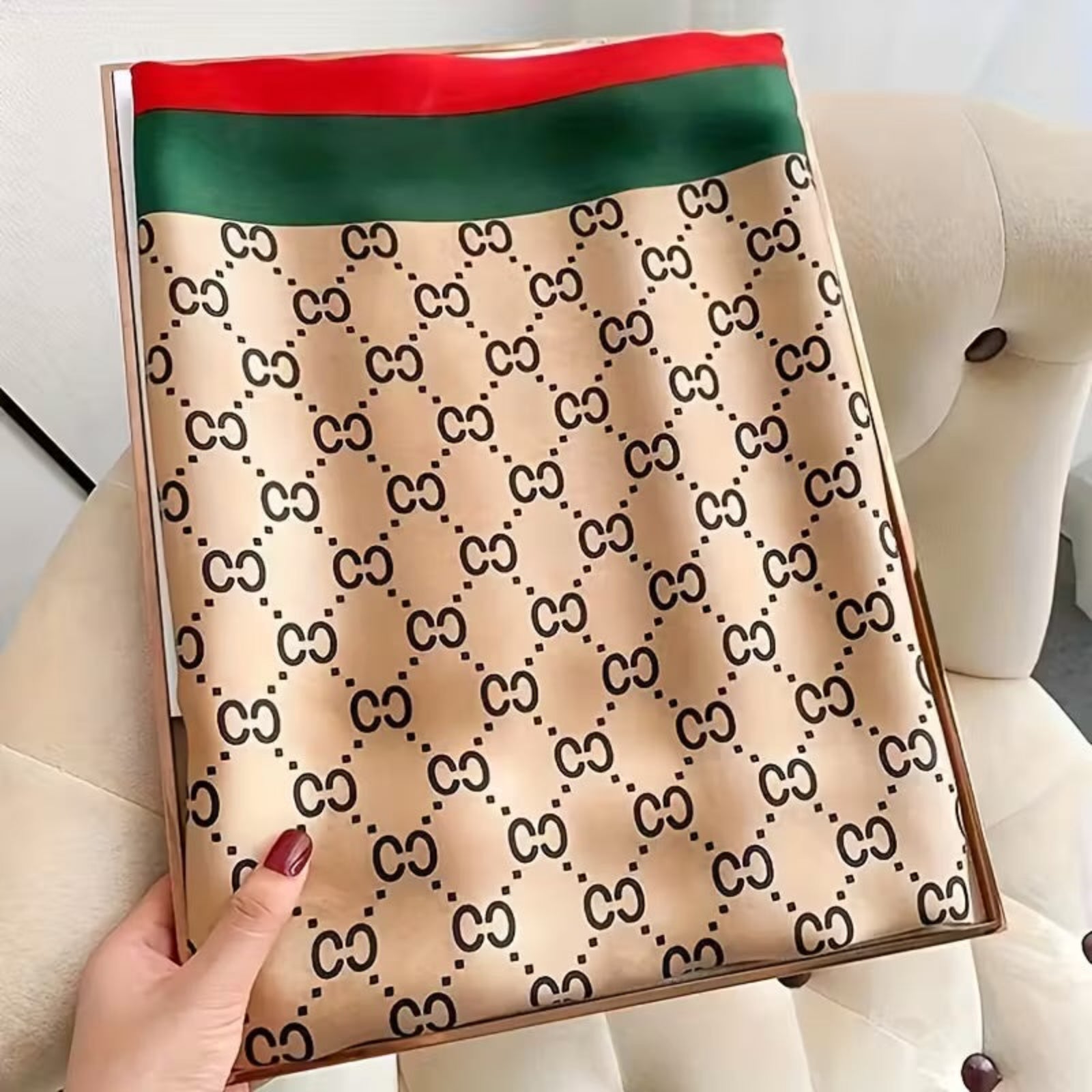 Luxury monogram patterned satin silk stole kept in a box 