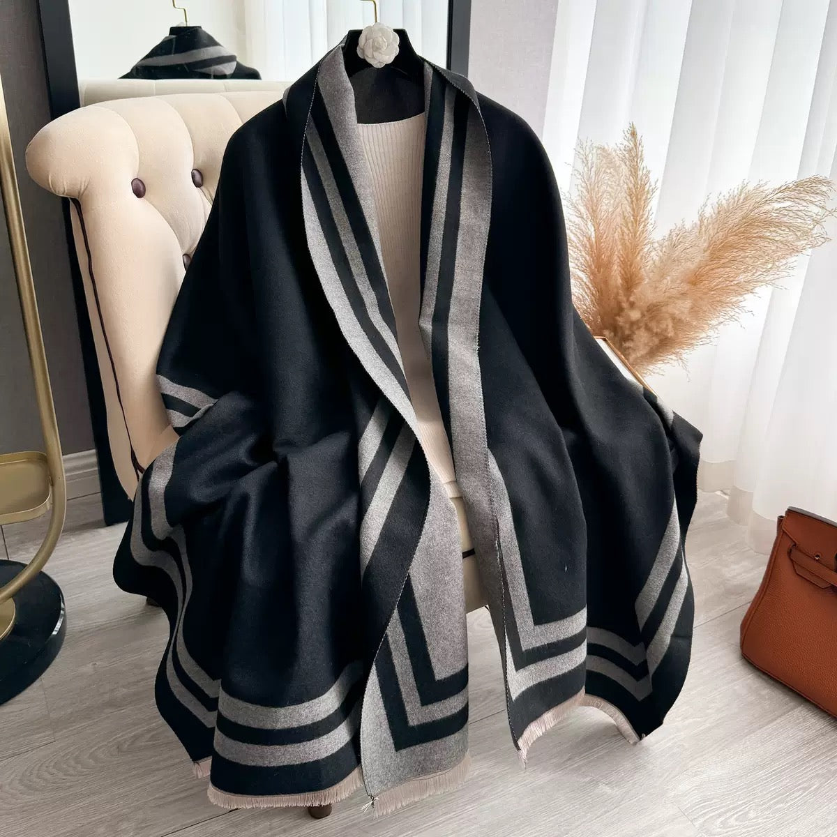 Cozyzone Classic Striped Knit Scarf Shawl showing timeless black and grey reversible jacquard stripe on soft faux cashmere fabric
