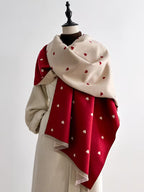 The Crimson Hearts Cashmere Wrap draped and styled showing full bold crimson heart design on premium soft faux cashmere
