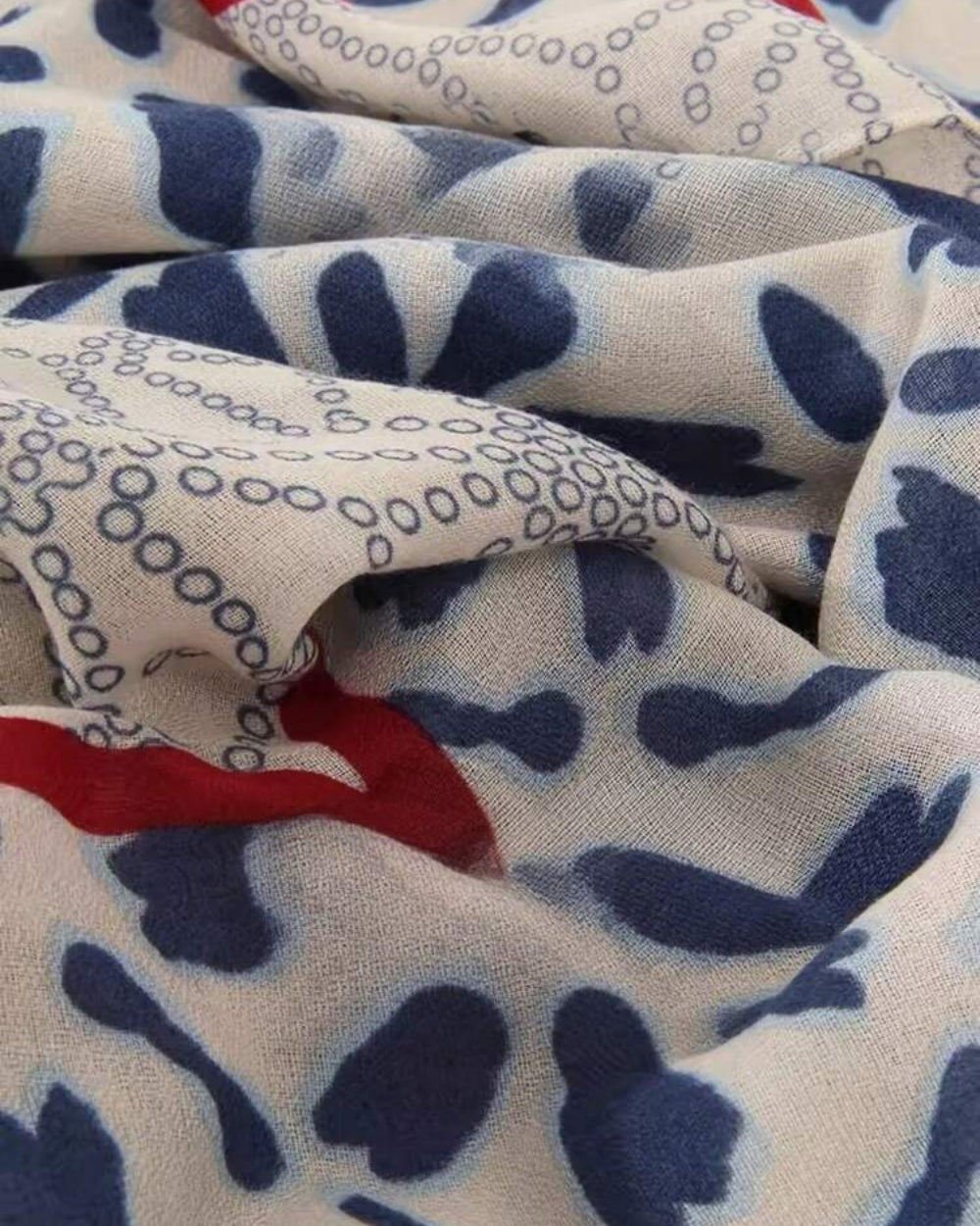Close-up of Elyria Indigo Bloom Stole viscose cotton fabric texture