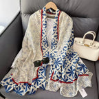 Elyria Indigo Bloom Stole flat lay with red trim border detail