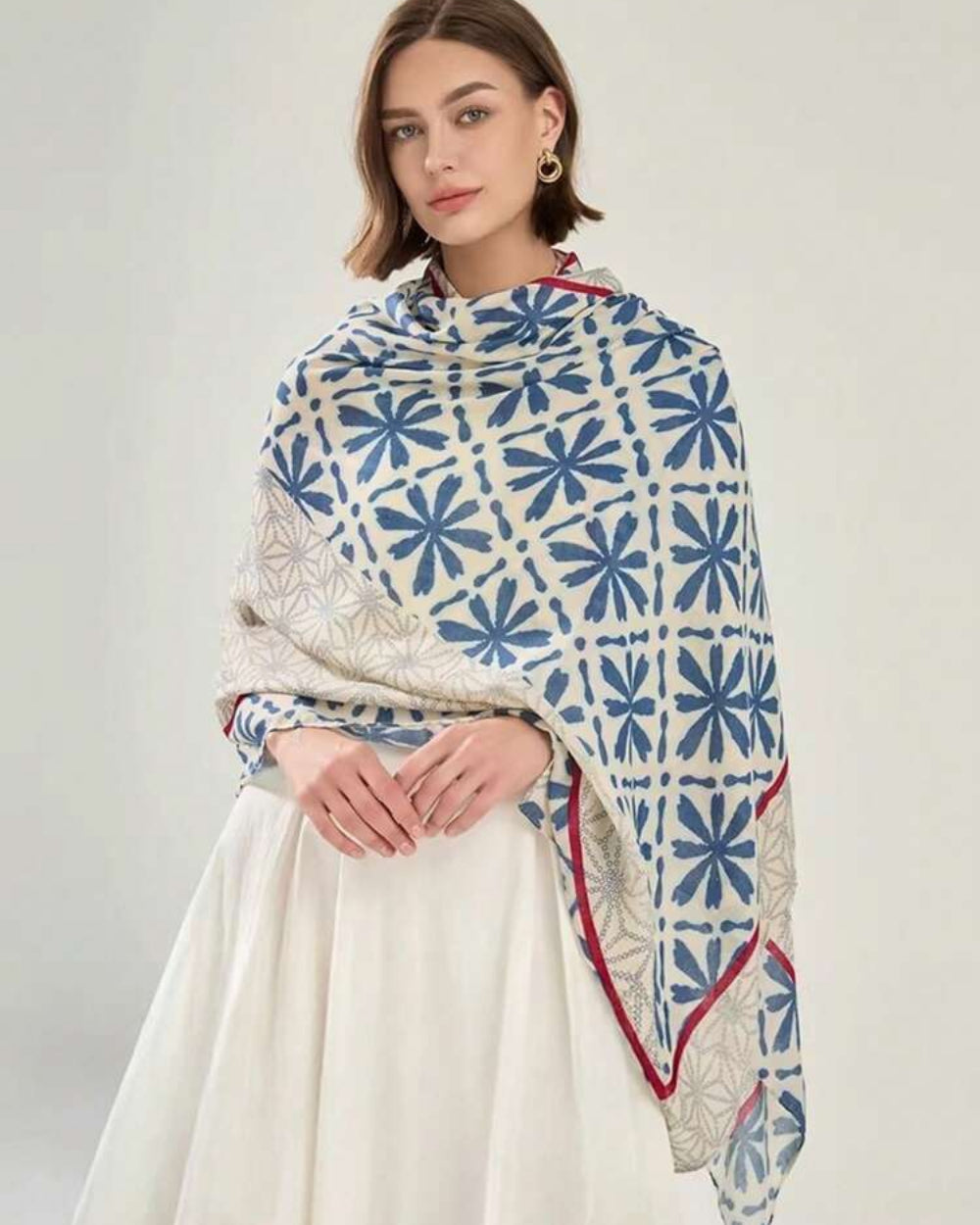 Elyria Indigo Bloom Stole draped around shoulders, front view