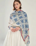 Elyria Indigo Bloom Stole draped around shoulders, front view