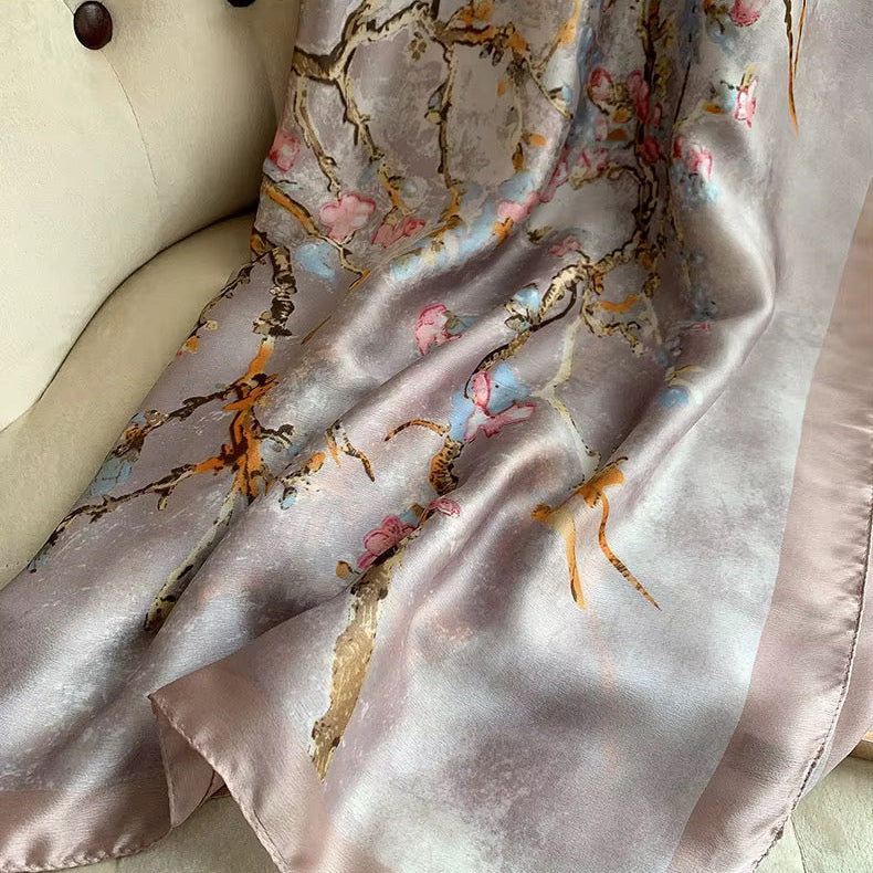 The Enchanted Blossom Silk Stole shown in detail view displaying delicate enchanted blossom floral print on smooth imitation silk fabric
