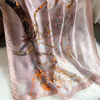 The Enchanted Blossom Silk Stole draped and styled showing full romantic blossom print on luminous imitation satin silk

