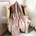 The Enchanted Blossom Silk Stole showing romantic delicate blossom floral print on smooth imitation silk fabric in 180x90cm format
