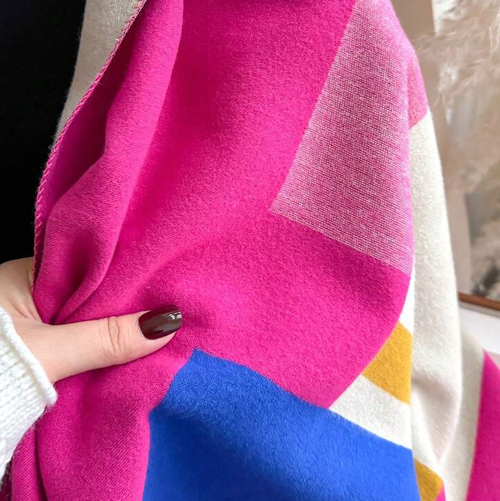 Close-up of The Fuchsia Mosaic Cashmere Wrap showing soft faux cashmere fabric texture with detailed vivid fuchsia mosaic geometric print
