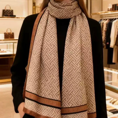 Woman wearing geometric basketweave imitation silk stole in beige with brown Greek key border - luxury scarf styling