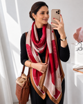 Woman wearing the Hafi Elegant Floral Silk Scarf in crimson red, ivory white and golden brown geometric floral print, styled as a luxurious imitation silk scarf by Westery Fashion House.  