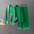 Green knit top and wide-leg pants with matching houndstooth shawl