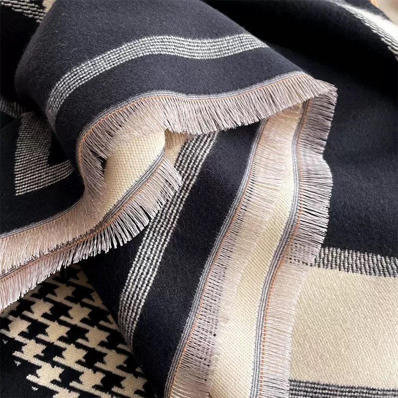 The Kensington Houndstooth Wrap draped and styled showing full houndstooth check pattern on premium faux cashmere
