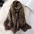 Leopard Whisper Stole in brown satin displayed flat, showcasing the soft sheen and leopard print design.