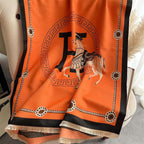 Close-up of premium faux cashmere knit fabric with equestrian horse artwork.