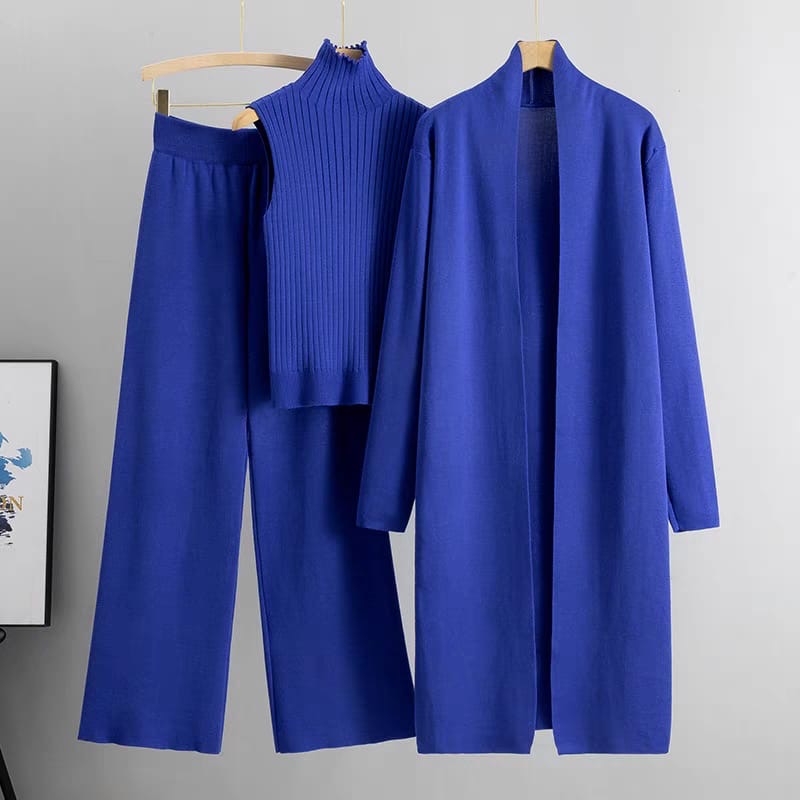 Royal blue 3-piece knit co-ord set laid flat showing top, pants, and cardigan
