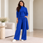 Woman wearing royal blue 3-piece knit co-ord set with longline cardigan
