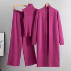 Magenta 3-piece knit co-ord set laid flat showing ribbed top, pants, and longline cardigan