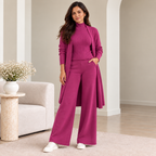Woman wearing magenta 3-piece knit co-ord set with longline cardigan and ribbed top
