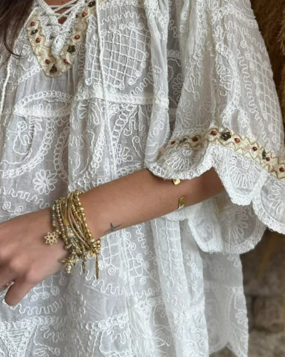 Close-up of Marisol Boho Embroidered Top scalloped sleeve embroidery