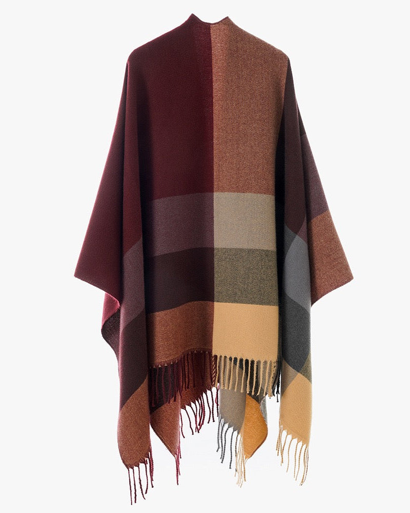 Close-up of The Merlot Mosaic Cashmere Cape showing soft faux cashmere fabric texture with detailed deep wine red merlot mosaic geometric print
