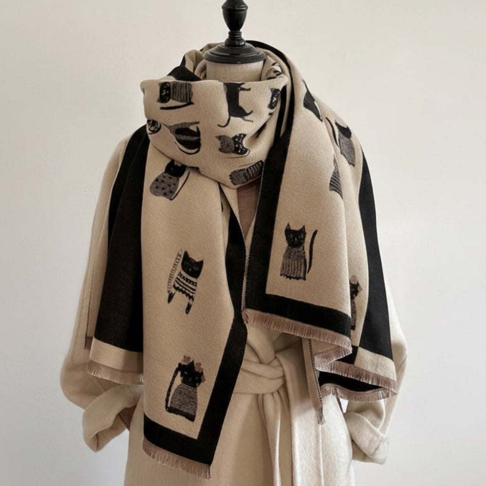 The Midnight Cats Reversible Wrap draped and styled showing full illustrated cat print on midnight faux cashmere base
