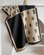 The Midnight Cats Reversible Wrap showing contrasting reversible side with illustrated cat motif in alternate tonal expression


