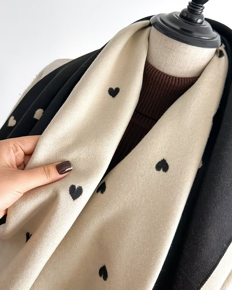 Close-up of The Midnight Hearts Cashmere Wrap showing soft faux cashmere fabric texture with detailed deep sophisticated midnight heart motif print
