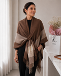 The Mocha Herringbone Cashmere Cape showing classic herringbone weave pattern in warm mocha coffee-brown and cream tones on soft faux cashmere in 170x135cm cape format
