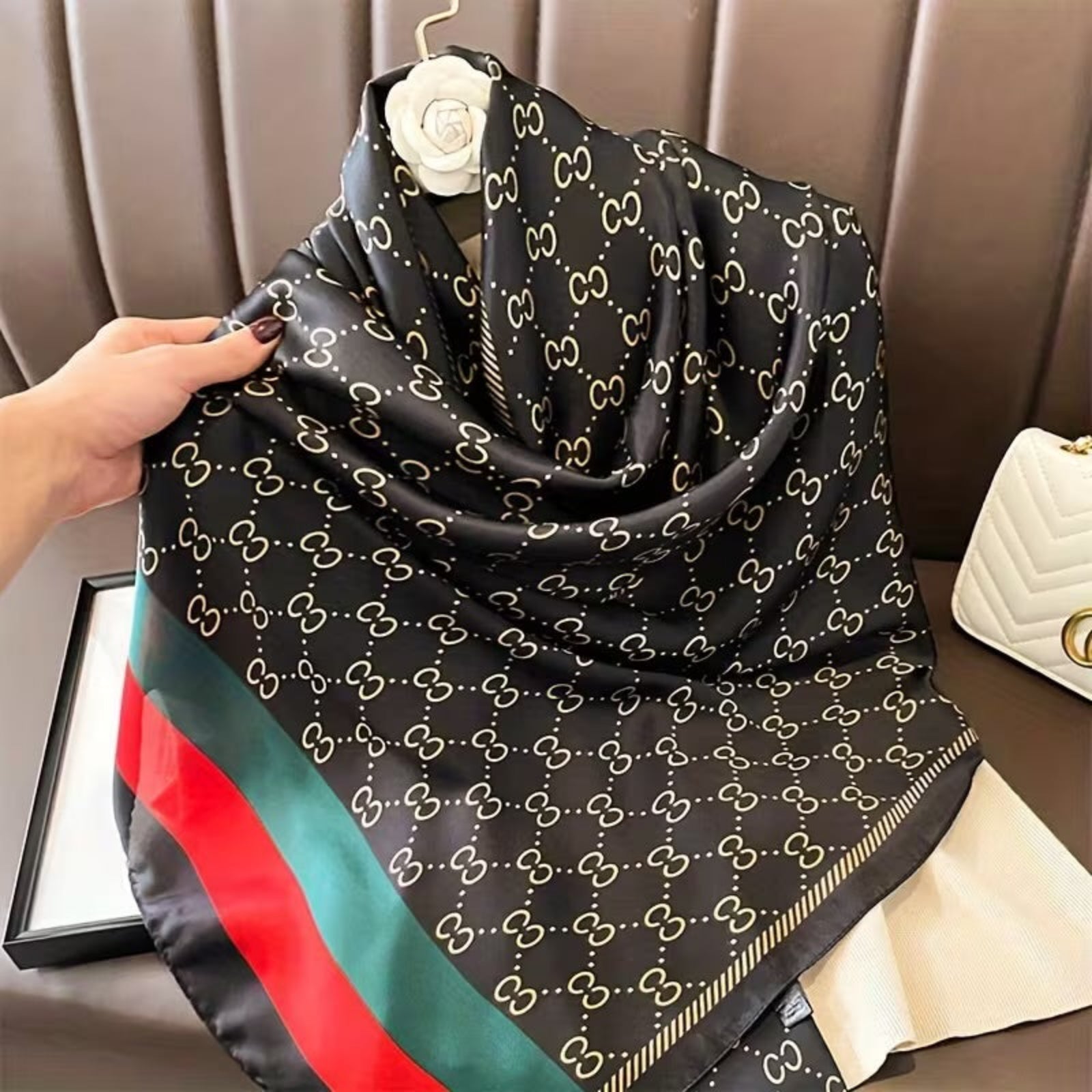 premium monogram print silk stole with glossy finish and bold border