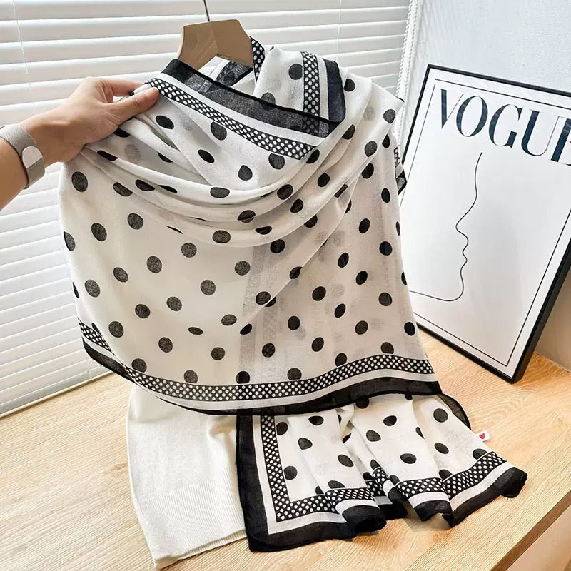 Close-up of The Parisian Polka Linen Stole showing natural linen fabric texture with classic polka dot print in Parisian-inspired design
