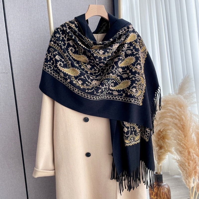 Regal Noir Embroidered Winter Stole draped over camel coat showing intricate gold paisley embroidery on deep black imitation cashmere fabric
