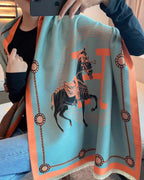 Blue reversible side of The Equestrian Royale Knit Wrap with horse motif.