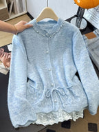 Powder blue women's knit cardigan featuring pearl embellishments and a delicate lace-trimmed hem