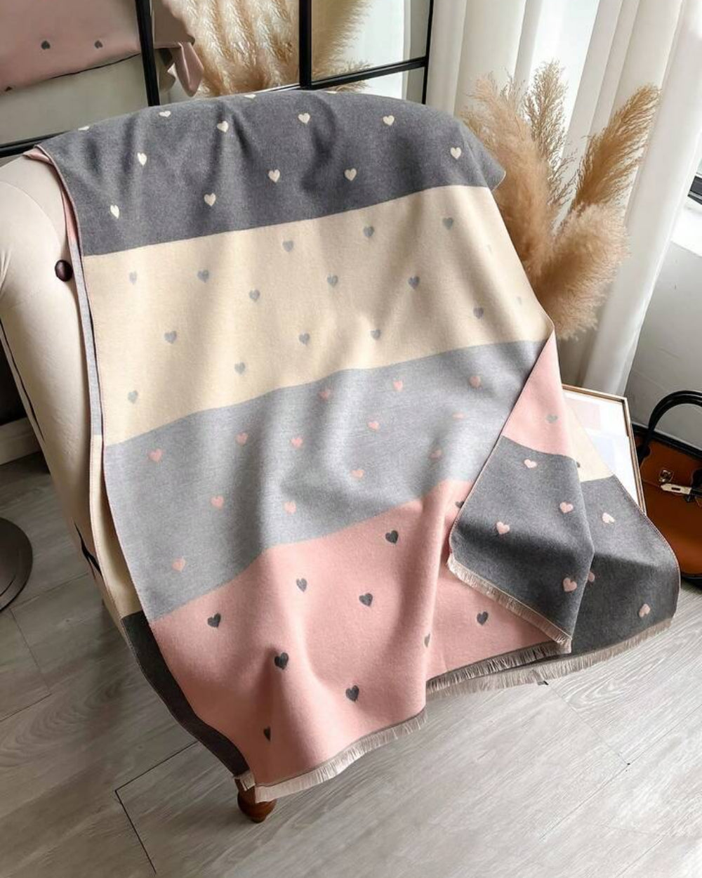 The Rosé Romance Reversible Stole draped and styled showing full rosé romantic design on soft blush faux cashmere fabric
