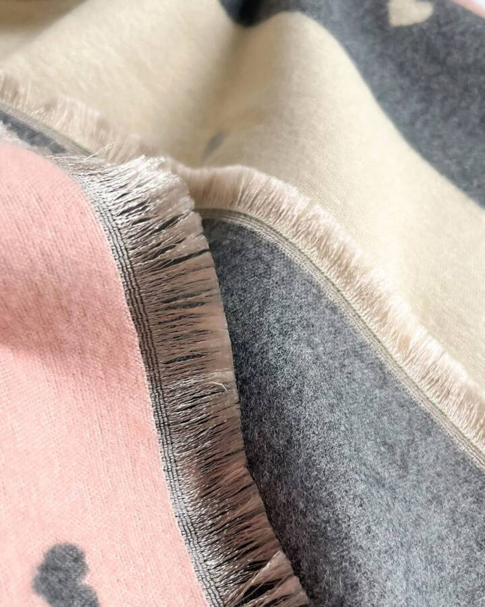 Close-up of The Rosé Romance Reversible Stole showing soft faux cashmere fabric texture with delicate rosé and blush romantic design detail

