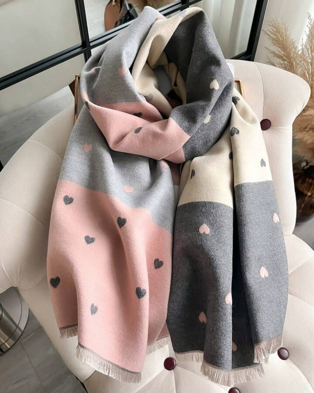 The Rosé Romance Reversible Stole showing primary rosé side with warm blush pink romantic design on soft faux cashmere fabric
