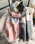 The Rosé Romance Reversible Stole showing primary rosé side with warm blush pink romantic design on soft faux cashmere fabric

