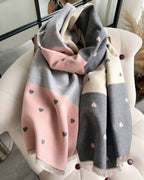 The Rosé Romance Reversible Stole showing primary rosé side with warm blush pink romantic design on soft faux cashmere fabric
