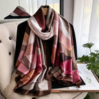 Rosewood Abstract Geometric Silk Stole draped on a display, showcasing its elegant abstract geometric design and silky finish.