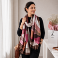 Woman wearing the Westery Rosewood Abstract Geometric Silk Stole featuring rosewood, blush pink, beige, and brown geometric patterns