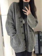 The Cozy Haven oversized heather grey knit cardigan with long sleeves, front buttons and patch pockets