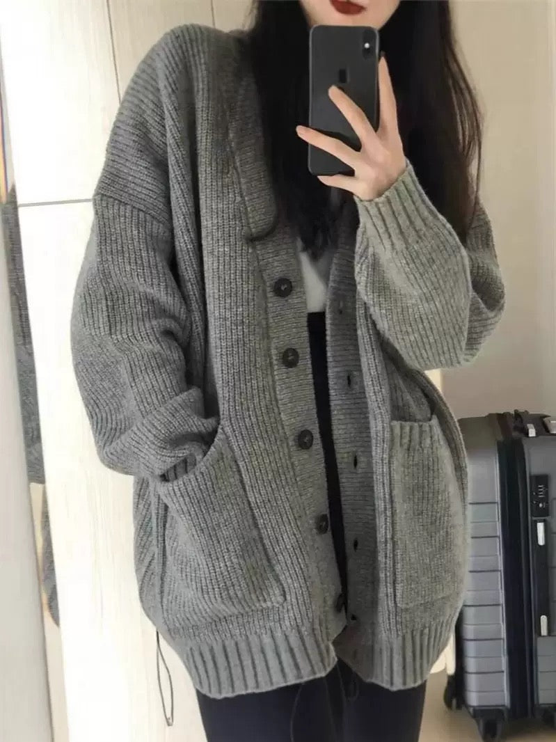 The Cozy Haven oversized heather grey knit cardigan with long sleeves, front buttons and patch pockets
