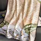 Full fabric view of the Westery Botanical Sketch premium silk scarf layout, displaying the repeating camel-colored fine-line floral sketches and a large statement ivory rose bloom with sage green leaves.
