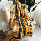 Golden Carriage Equestrian luxury silk stole by Westery draped vertically over an armchair, showcasing the rich mustard yellow, navy blue, and cream color palette with detailed royal carriage motifs.
