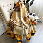Westery Golden Carriage Equestrian premium silk scarf elegantly styled over a chair next to sunglasses and a luxury handbag, accentuating its classic vintage royal aesthetic.
