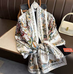 The Imperial Garden Bird & Bloom premium silk stole by Westery styled with an elegant front knot display, showcasing the symmetrical flower paths, exotic bird prints, and high-end satin sheen.
