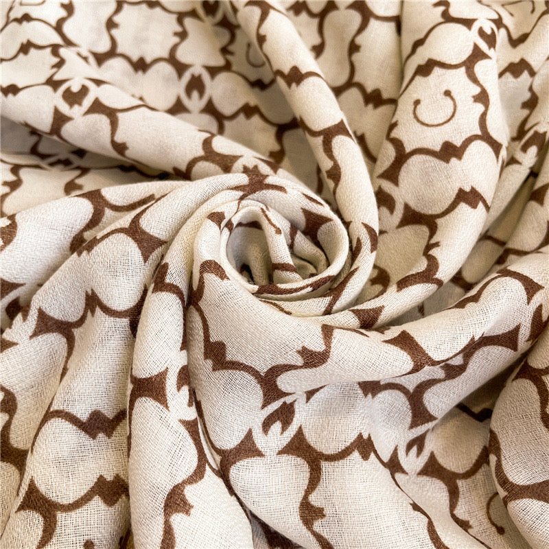 Detailed view of the fabric folds on the Westery Moroccan Lattice Luxe premium stole, highlighting the lightweight drape, high-quality printing, and sophisticated neutral colorway.
