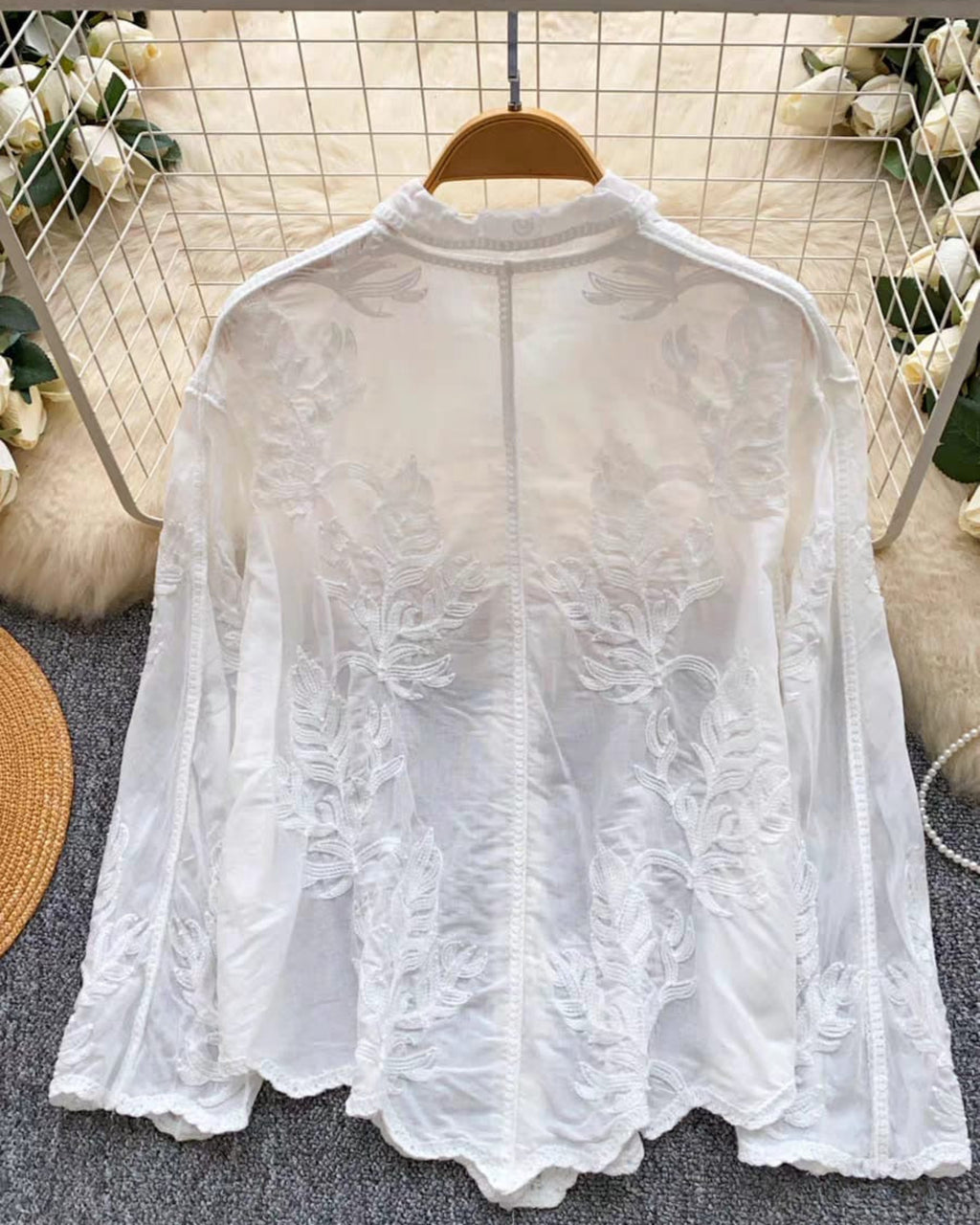 Back view of white embroidered linen shirt - natural breathable fabric for summer